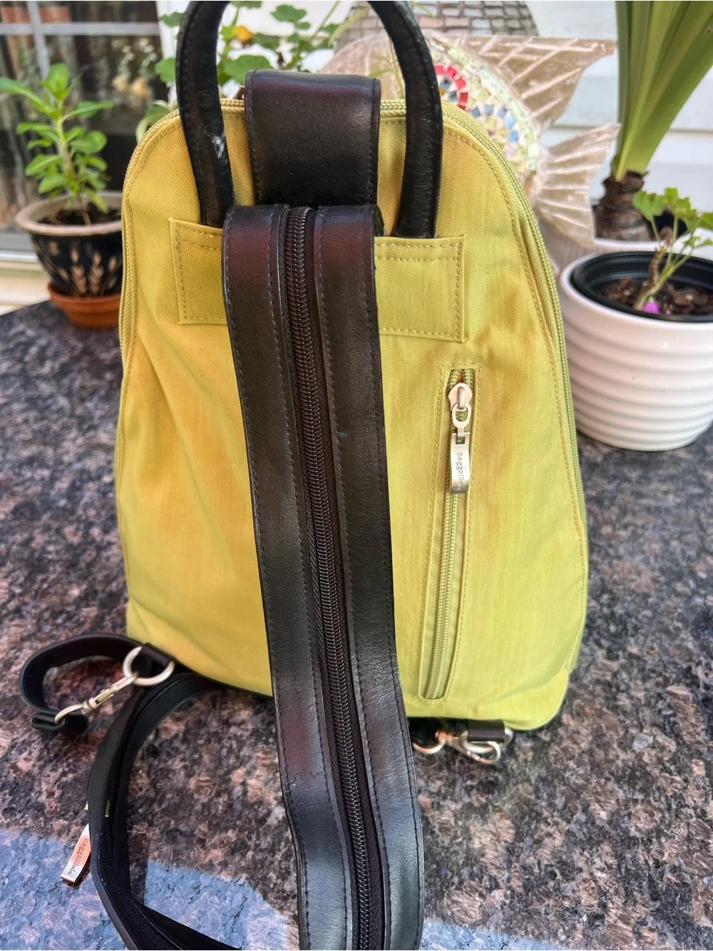 Baggallini Metro Backpack Sling Bag Green Water Resistant Travel